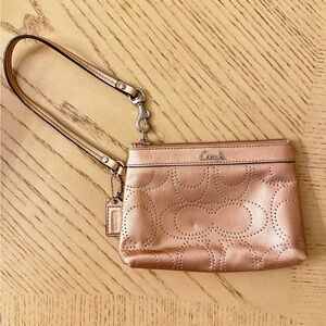 Coach rose gold Wristlet Bag